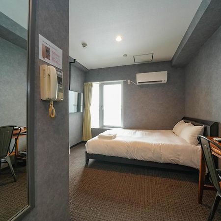 Residence Hotel Stripe Sapporo Bagian luar foto