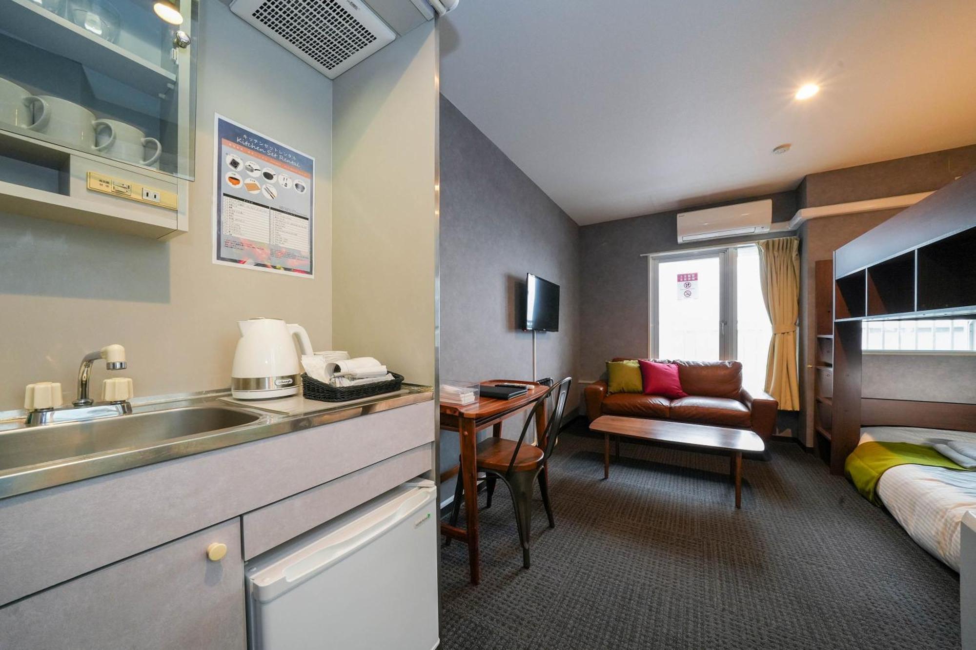 Residence Hotel Stripe Sapporo Bagian luar foto