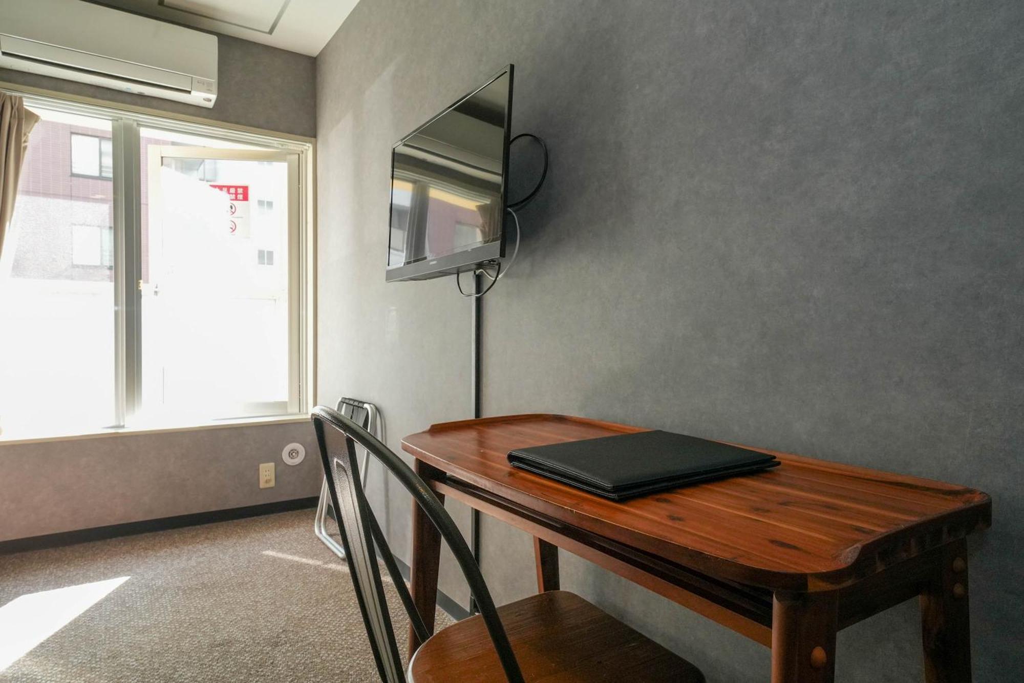 Residence Hotel Stripe Sapporo Bagian luar foto