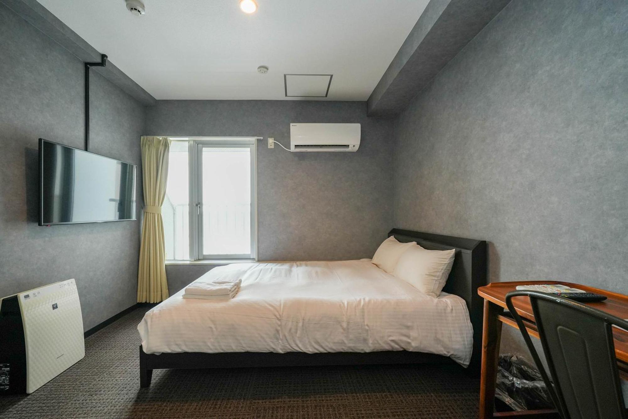Residence Hotel Stripe Sapporo Bagian luar foto