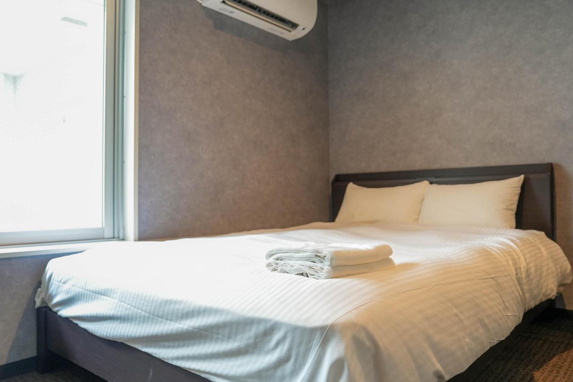 Residence Hotel Stripe Sapporo Bagian luar foto