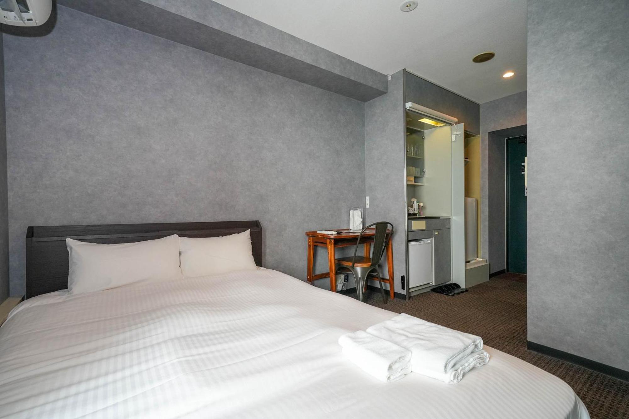 Residence Hotel Stripe Sapporo Bagian luar foto