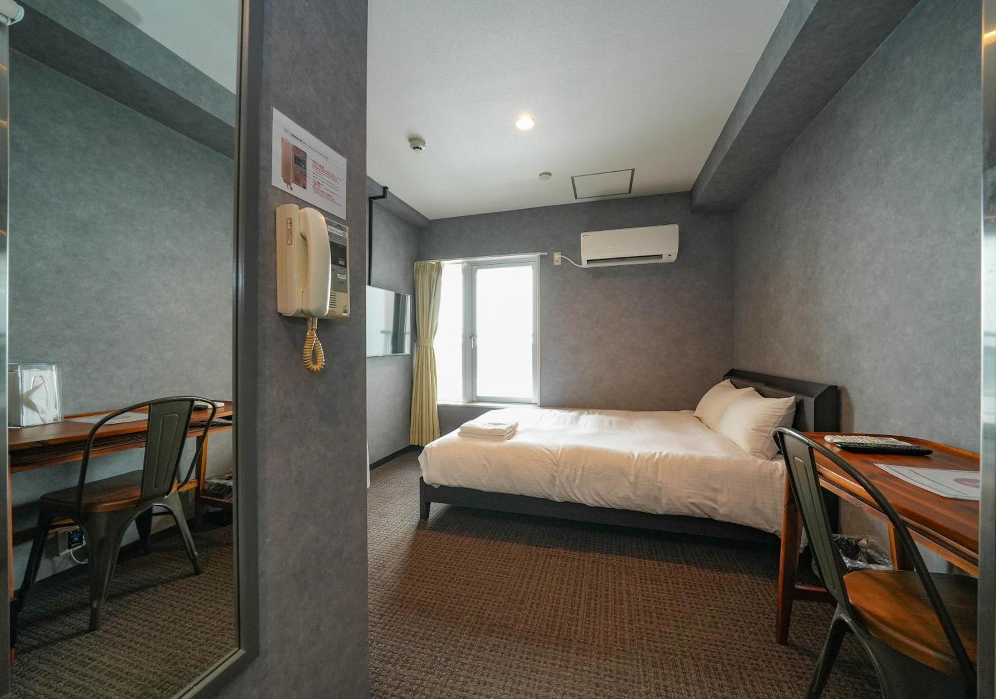 Residence Hotel Stripe Sapporo Bagian luar foto