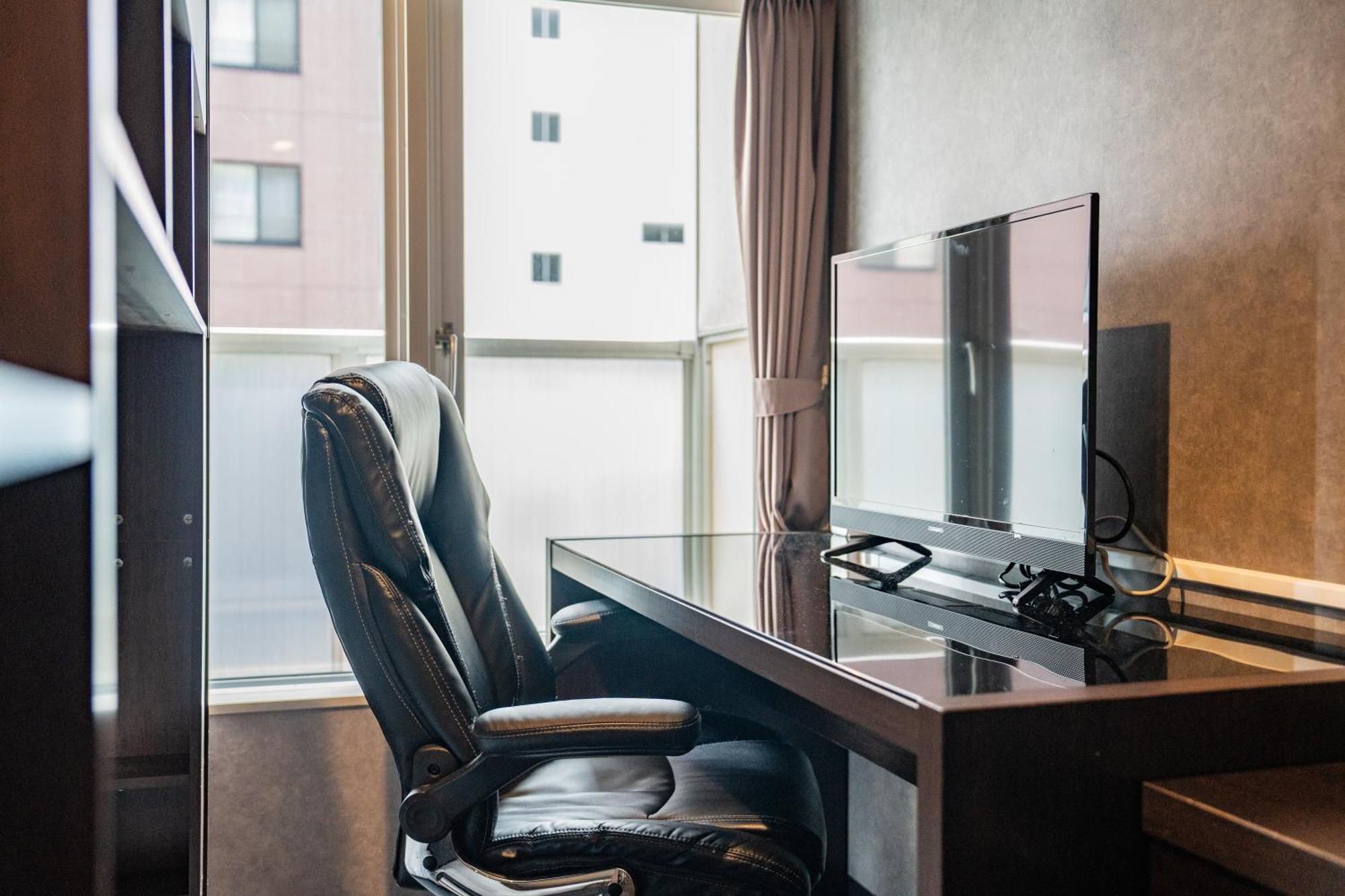 Residence Hotel Stripe Sapporo Bagian luar foto